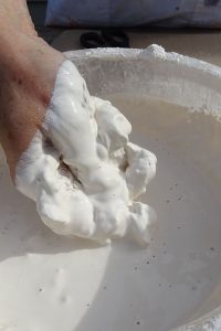 Mixing plaster: use your hand to squash any lumps