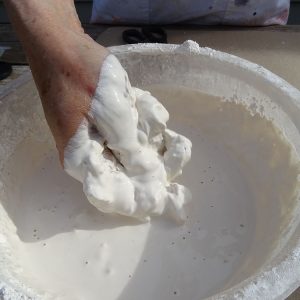 Mixing plaster: use your hand to squash any lumps