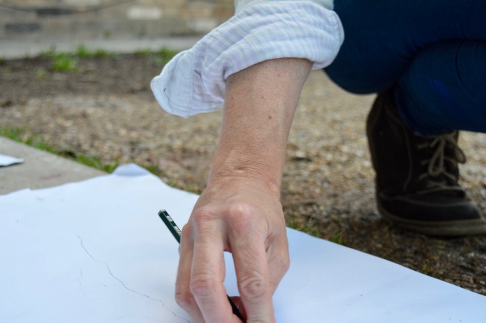 Horizontal: Now drop the pencil so it's lying horizontally across the paper 