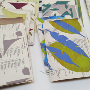 Selection of over printed screenprints, folded in half