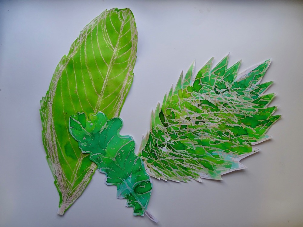 Wax resist autumn leaves by year 3-6 pupils at Dent C of E Primary School in the Yorkshire Dales, Cumbria