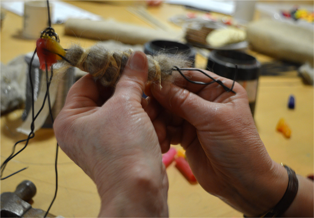 Combining wire, scrim, wax to build form