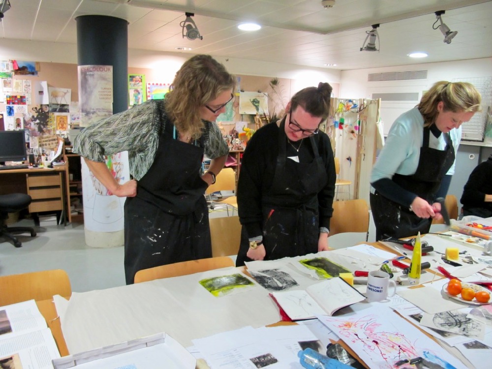 Teacher working on a production of prints and sharing her work with Kate - SC Fitz