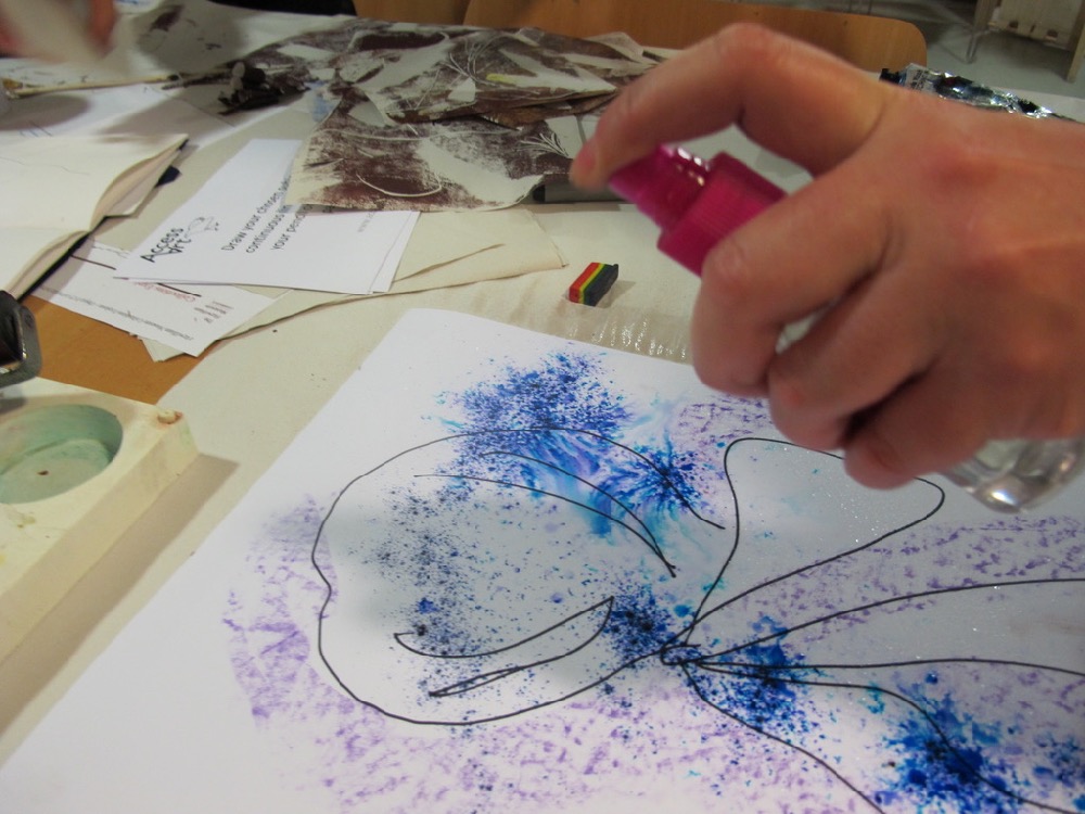 Spraying water over Brusho Crystals 