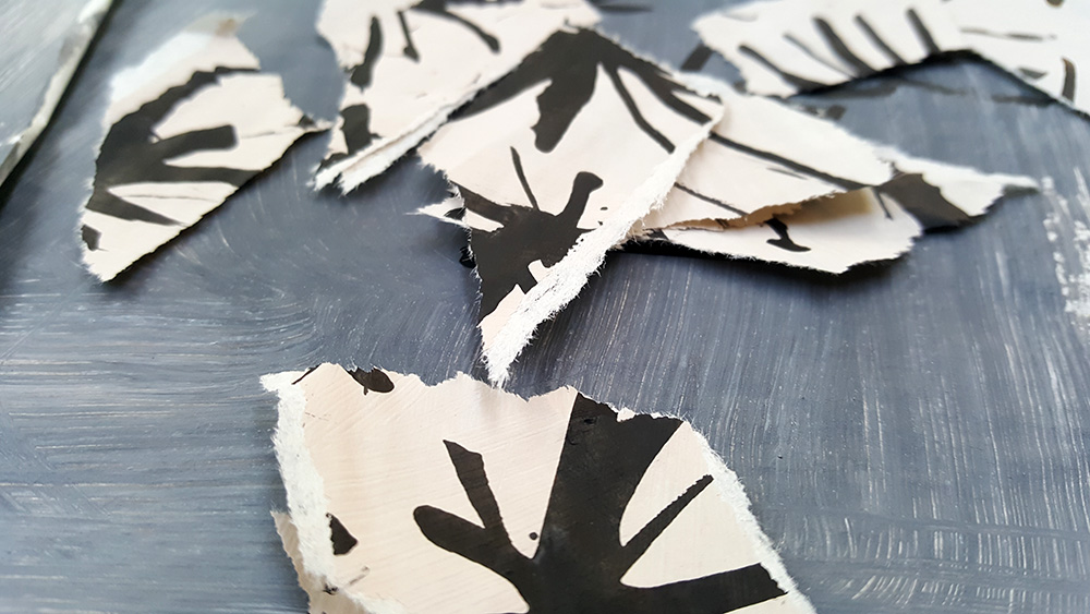 tear up pieces of patterned paper
