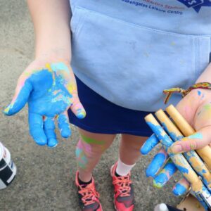 blue paint on hands