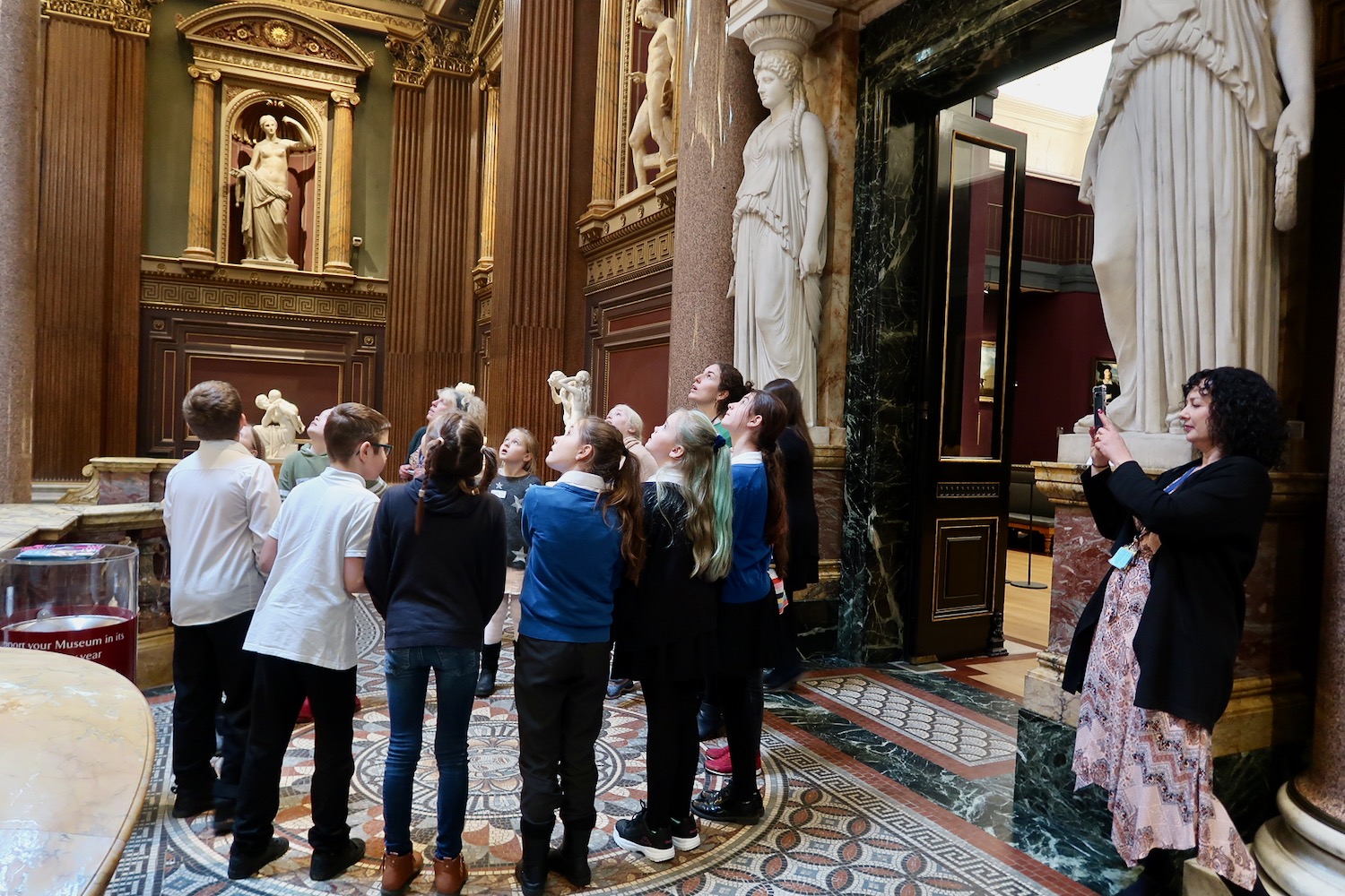 Pupils from Morley Memorial School and St Peters juniors looking at the grand entrance of the Fitzwilliam Museum, Cambridge