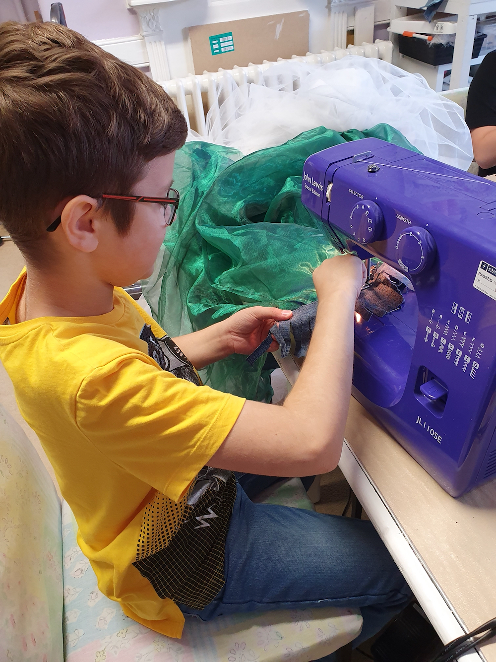 Sewing Psyche's dress on a sewing machine with Natalie Bailey for Inspire Fitzwilliam Museum Cambridge 