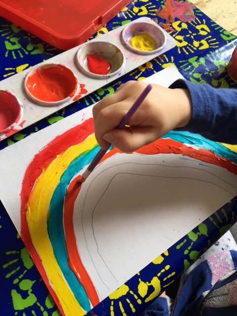 painting each section of the rainbow