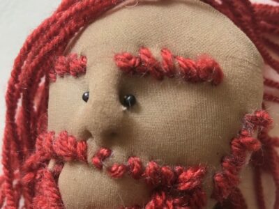 facial hair and beard sewn on with wool