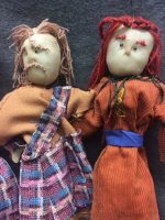 Two puppets showing variation achieved through different costume designs