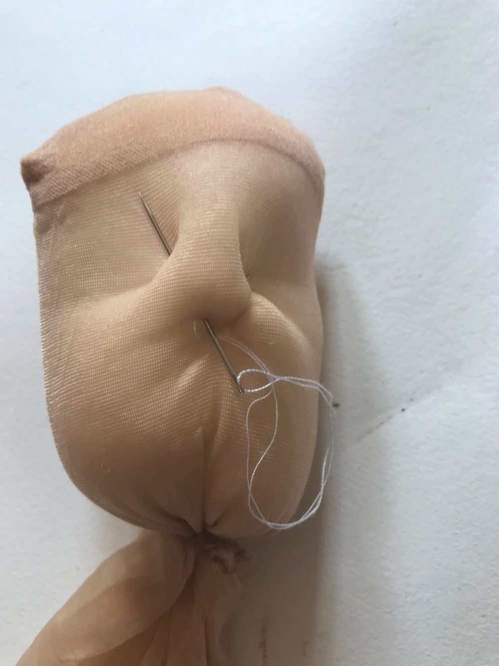 stitching the form of the nose