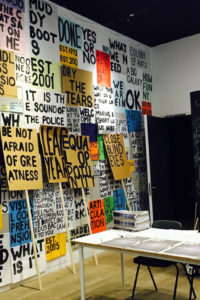 Messages written on paper and stuck on the wall by Stephanie Cubbin