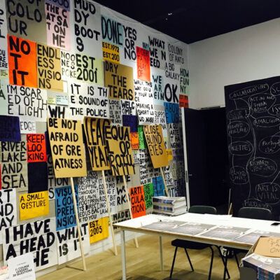 Messages written on paper and stuck on the wall by Stephanie Cubbin