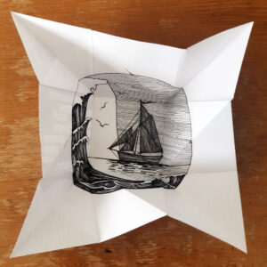 An unfolded origami puzzle purse by Eilis Hanson