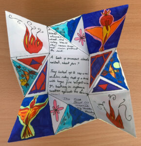 An unfolded origami puzzle purse created by children -by Eilis Hanson