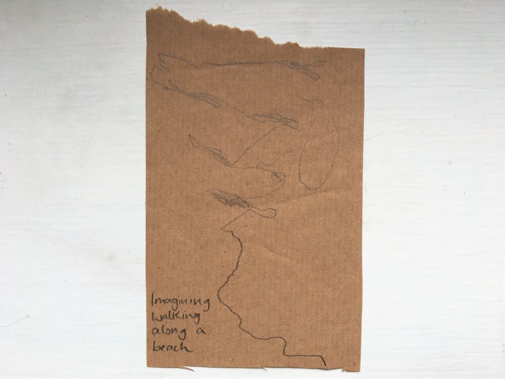 Drawing marks while imagining walking on the beach