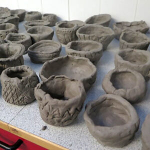 Sculptured clay pots by Katherine Woodard