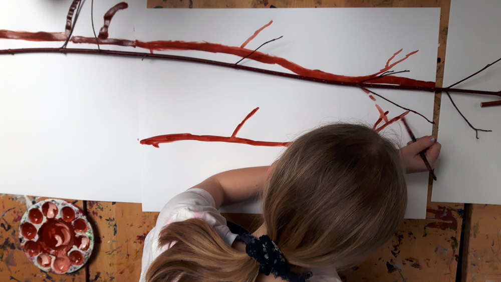 Older-child-painting-the-dogwood-by-Mostyn-de-Beer