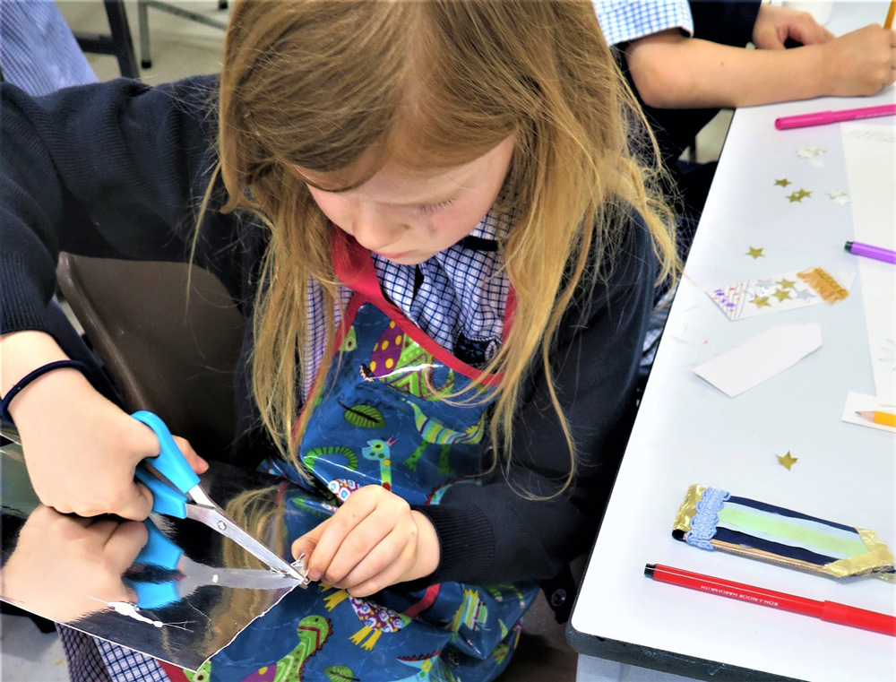 Making medals out of recycled materials by Jan Miller