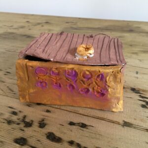 A replica Pandora's box made from clay