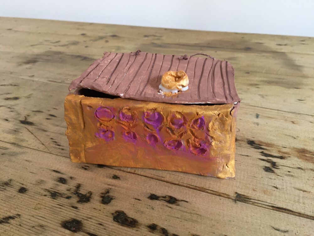 A replica Pandora's box made from clay