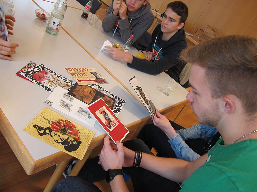 Young People in Germany looking at Australian Mail Art by Theresa Easton