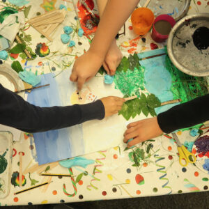 Children participating in a collaborative collage