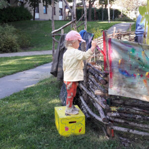 Child Painting The Fence By Mostyn de Beer