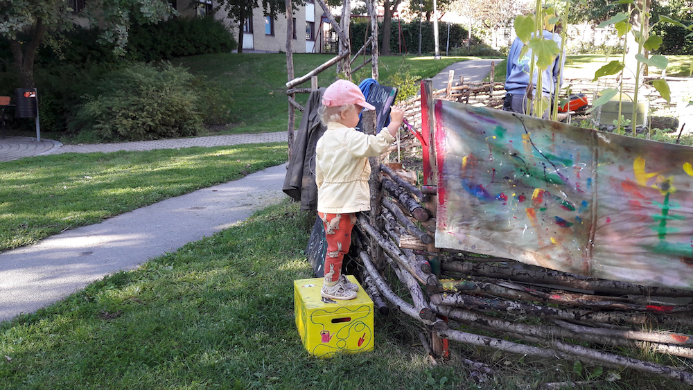 Child Painting The Fence By Mostyn de Beer