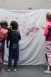 Children Painting On A Sheet by Mostyn de Beer