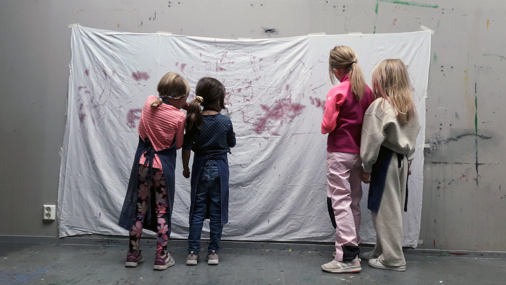 Children Painting On A Sheet by Mostyn de Beer