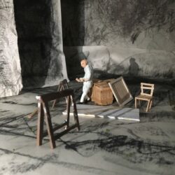 Create a charcoal cave inspired by theatre stages.