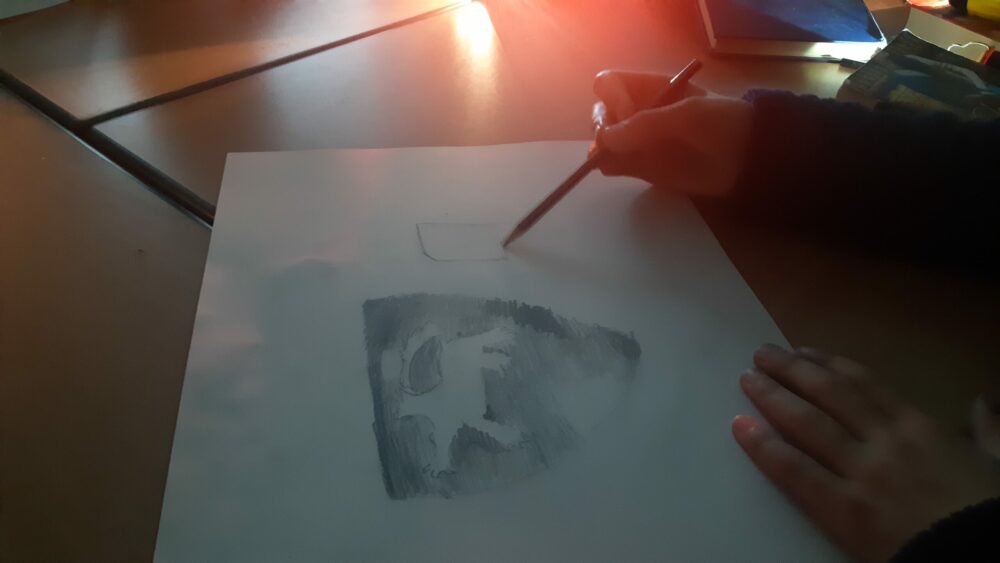 Drawing by torchlight.