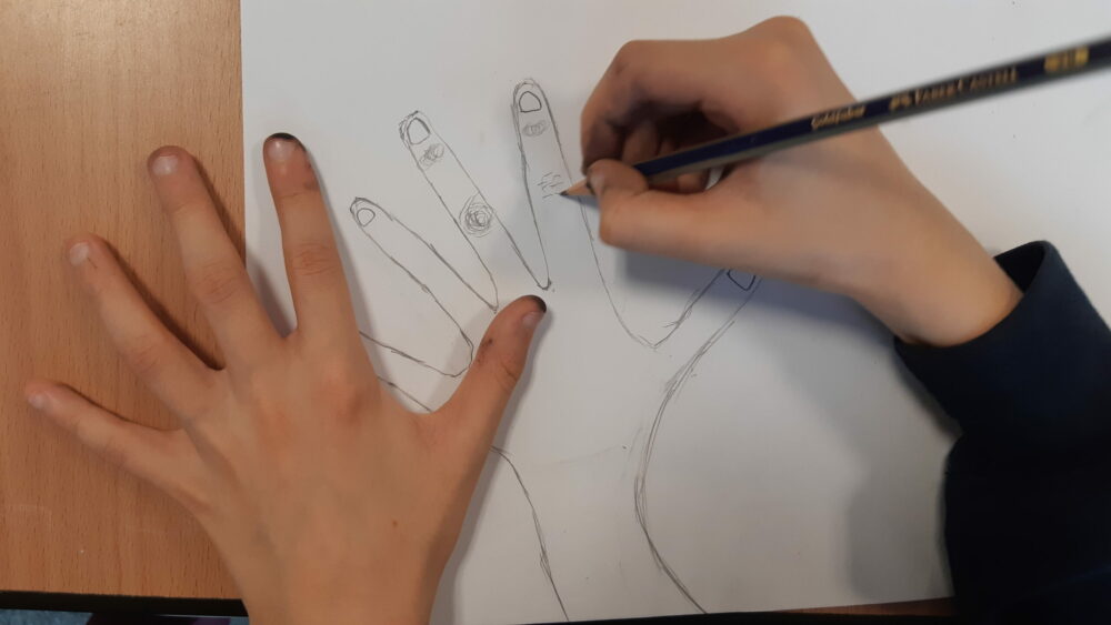 Observational drawing of hands.