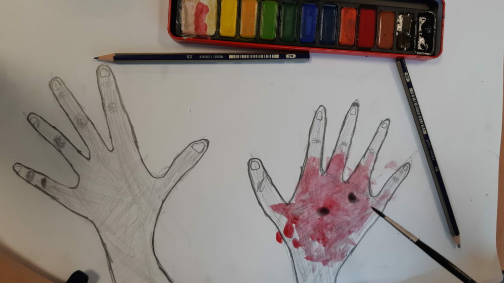 Using red wat colour on a drawing of hands.