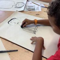 Drawing a portraits of a figure from Ancient Greece.
