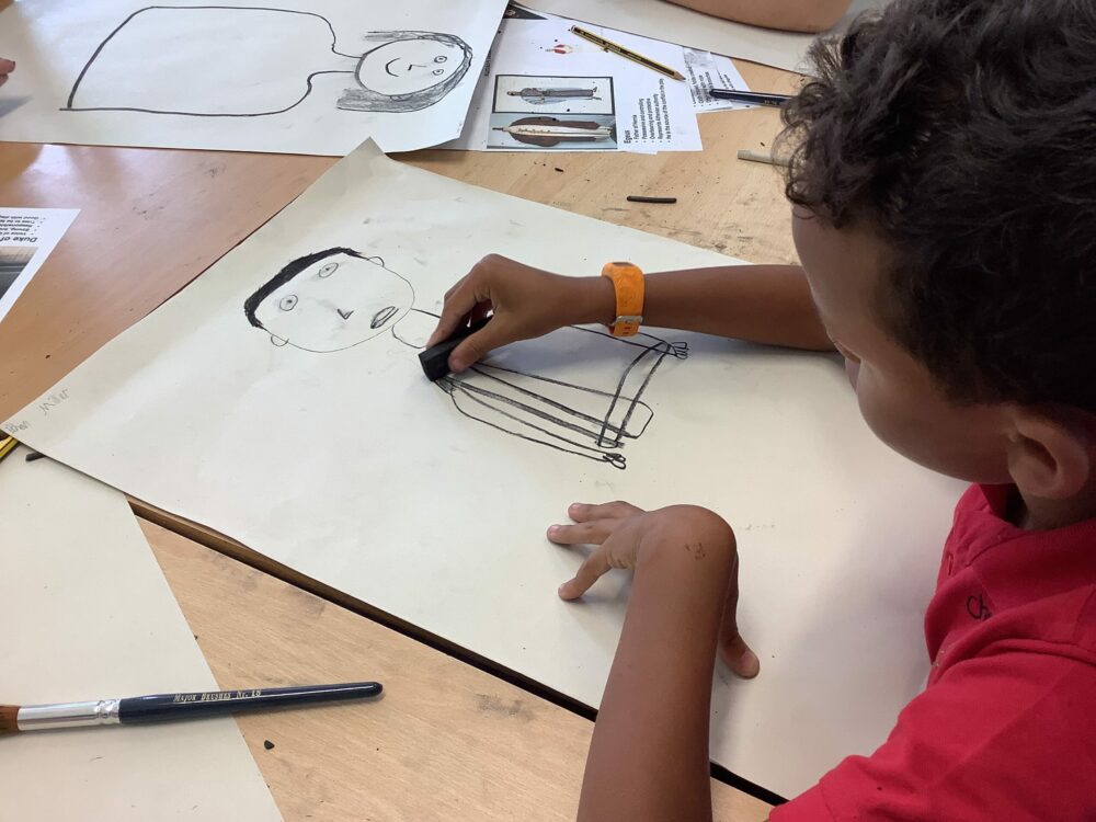 Drawing a portraits of a figure from Ancient Greece.