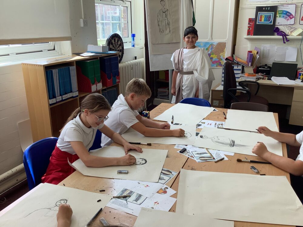 Modelling ancient Greek clothes.