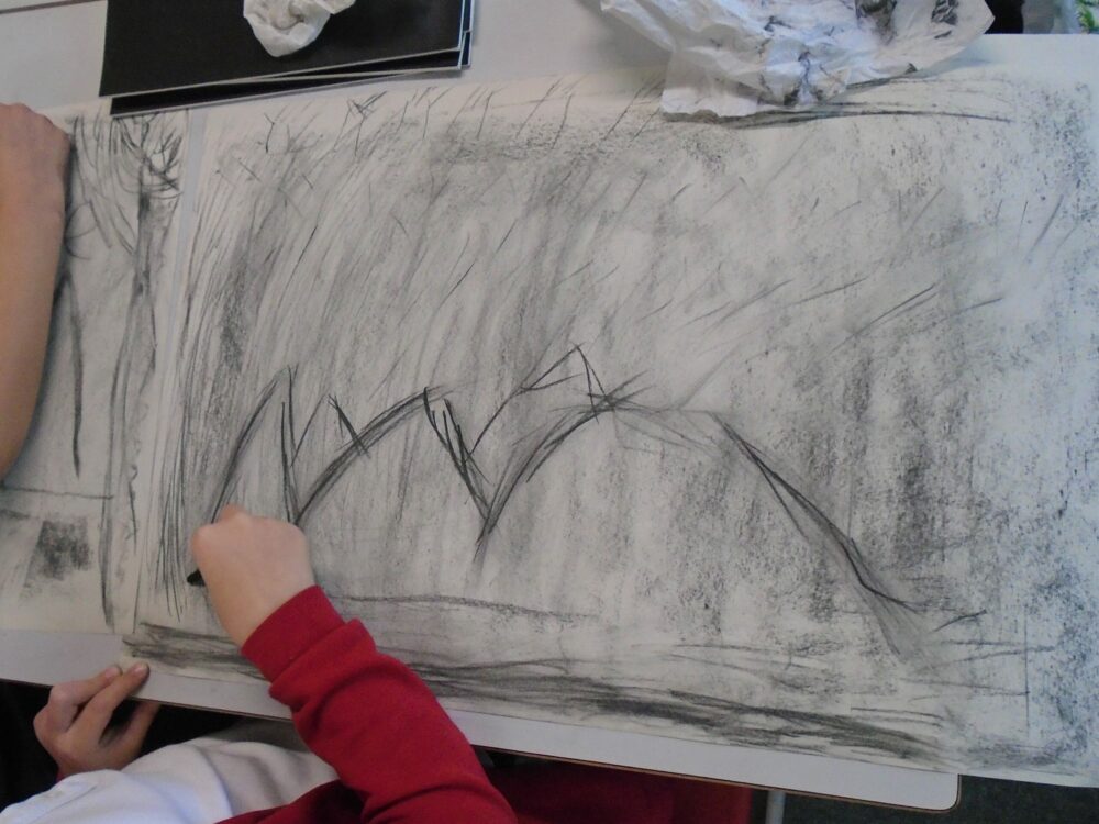 Creating a sense of landscape using charcoal.