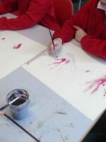 Using red water colour as 'blood on hands'