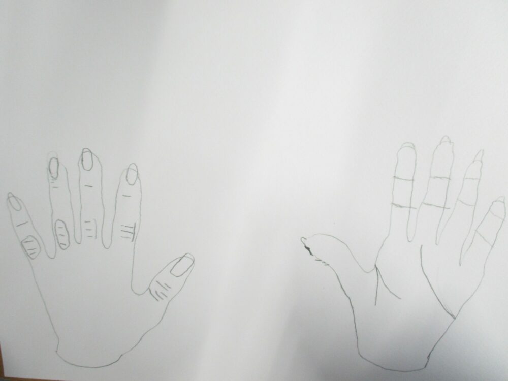 Drawing two hands.