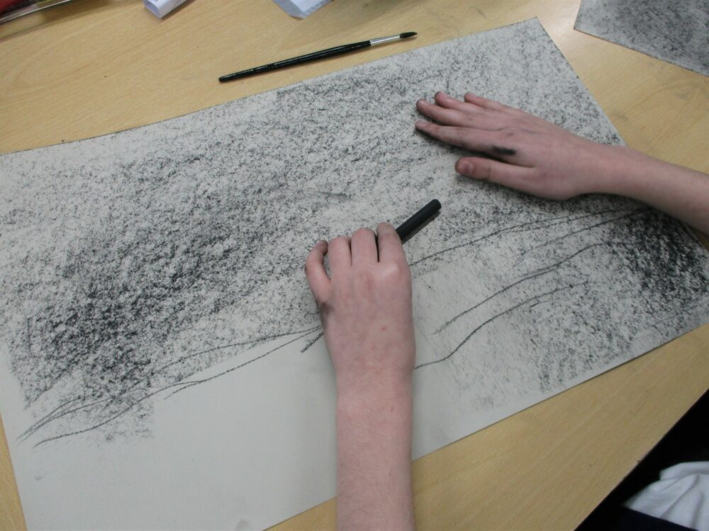Making sharper lines with charcoal.