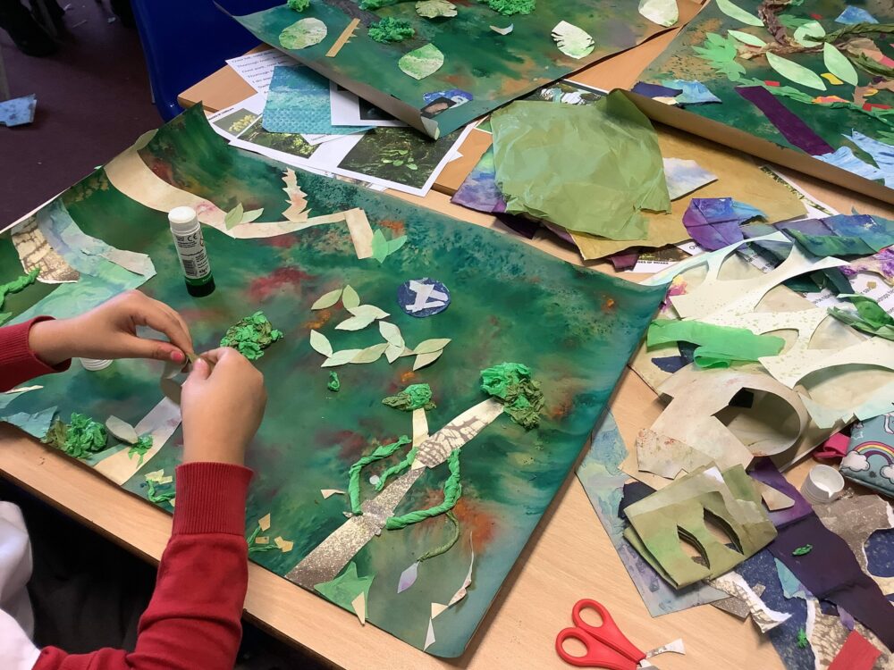 Cutting and scrunching paper to make leaves and foliage.