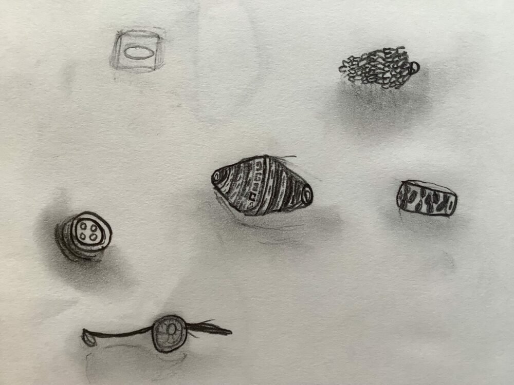A selection of small drawings made with pencil.