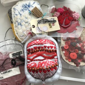 Examples of professional artist's textile blood bags by Mandy Barrett