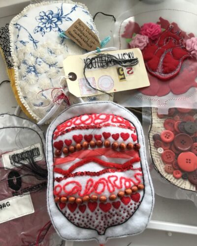 Examples of professional artist's textile blood bags by Mandy Barrett