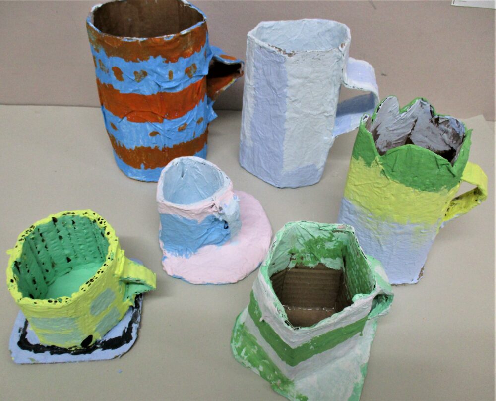 3D cups made from card and wet strength tissue paper.