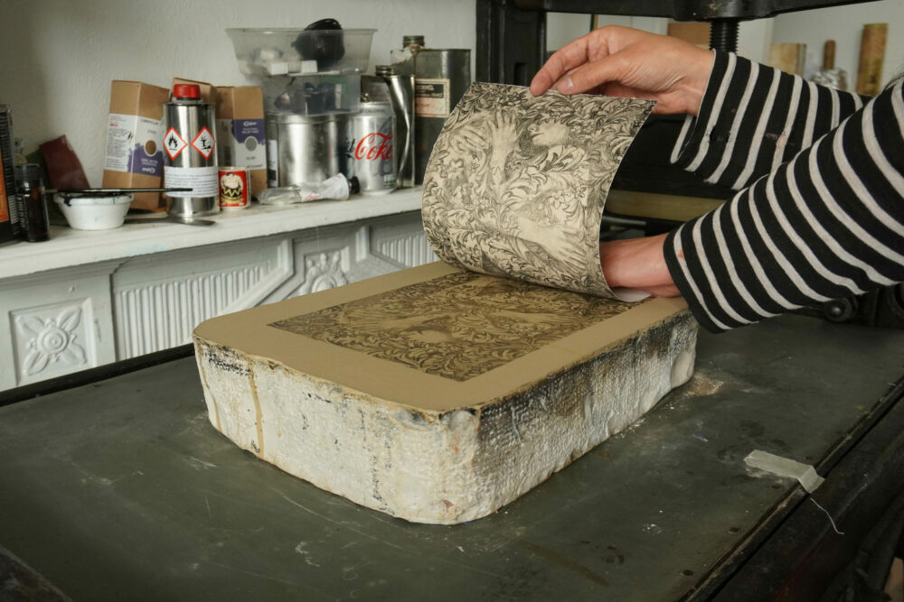 Stone printing in an artist studio