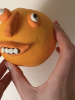 Plasticine Feature on an Orange by Tobi Meuwissen